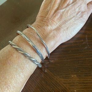 Sterling silver cuff bracelets.